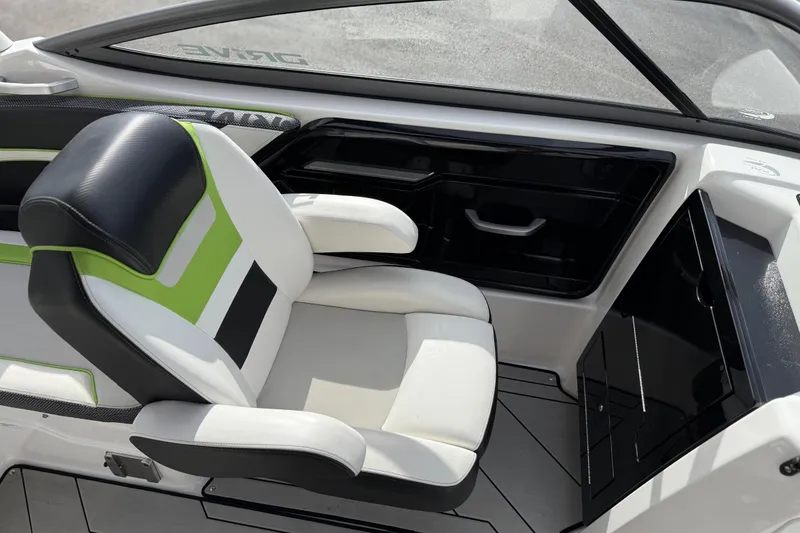 Slide: The Image of 2022 Yamaha Boats 212XD interior with modern seating and sleek design. - 31