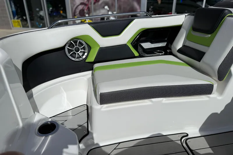 Slide: The Image of 2022 Yamaha Boats 212XD interior with stylish seating and speaker system. - 62