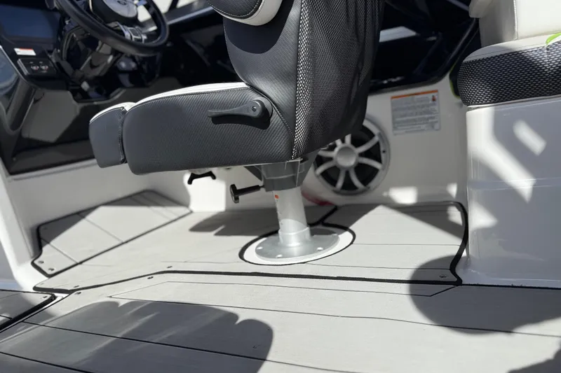 Slide: The Image of 2022 Yamaha Boats 212XD interior with sleek seating and modern design. - 64