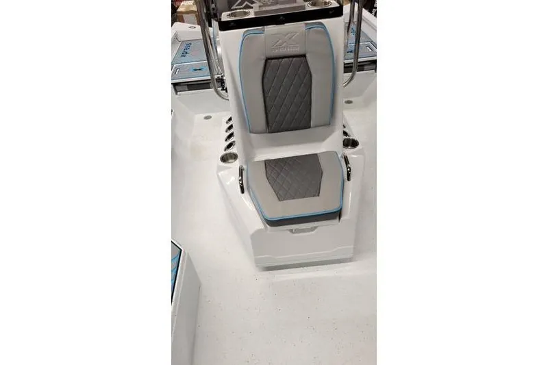 Slide: The Image of 2026 Xpress H20B Bay boat seat with gray and blue accents. - 17