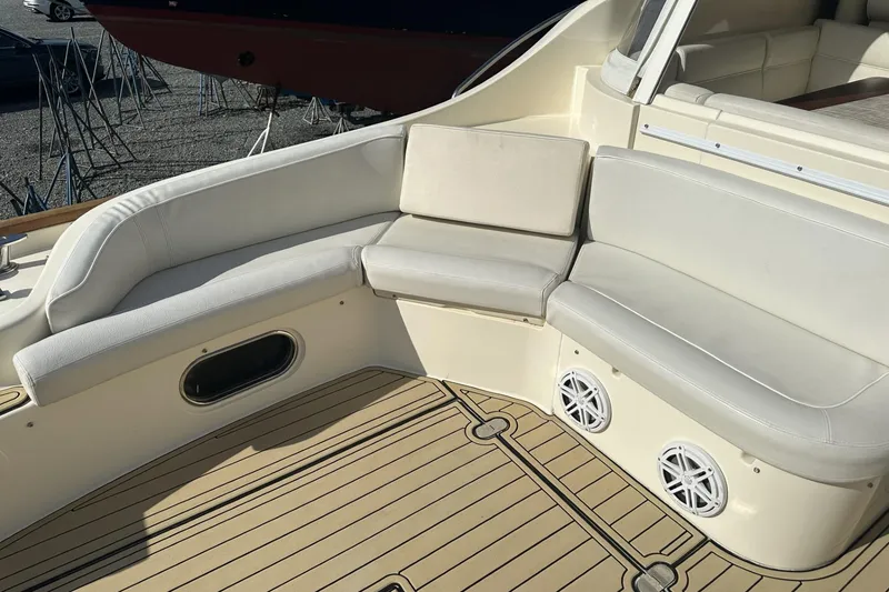 Slide: The Image of 2007 Mochi Craft 44 Dolphin yacht with elegant beige seating and teak deck. - 8
