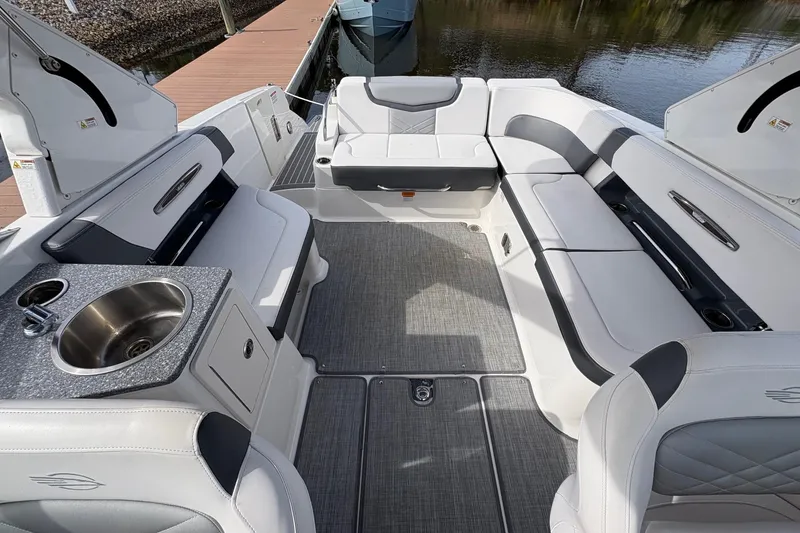 Slide: The Image of 2018 CHAPPARAL 287 SSX boat interior with spacious seating and modern design. - 14