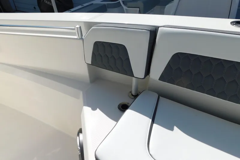 Slide: The Image of Interior of 2026 Cobia 285 Center Console boat with mirror and porthole. - 34
