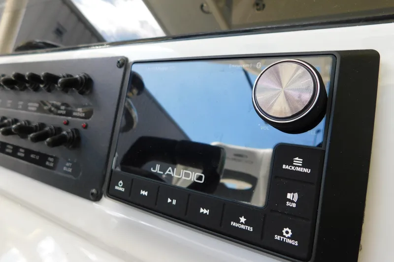 Slide: The Image of Control panel of 2026 Cobia 285 Center Console with Seakeeper system. - 41