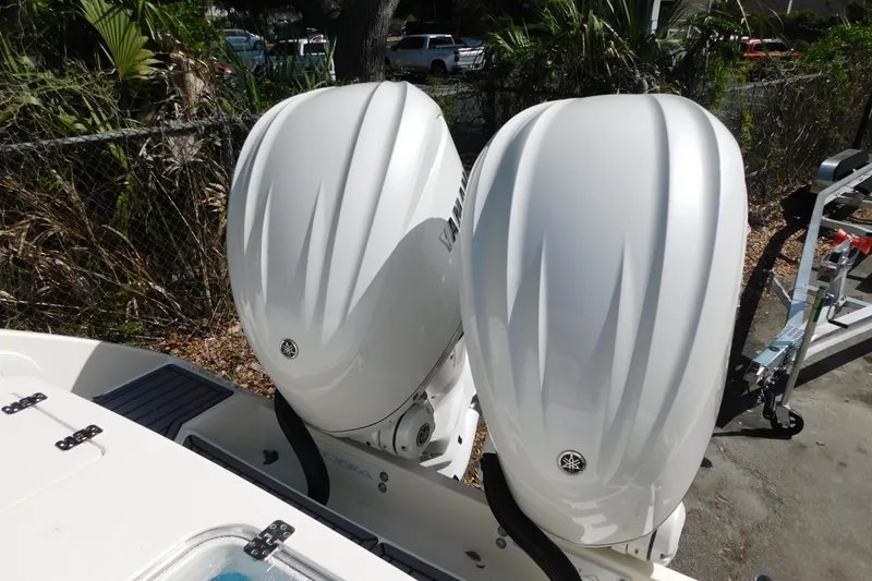 Slide: The Image of 2026 Cobia 285 Center Console boat roof with speakers and lights. - 46