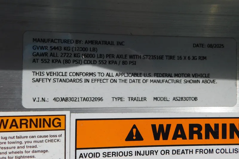 Slide: The Image of AmeraTrail trailer for 2026 Cobia 285 Center Console boat, featuring 'Load Launch Relax' slogan. - 54