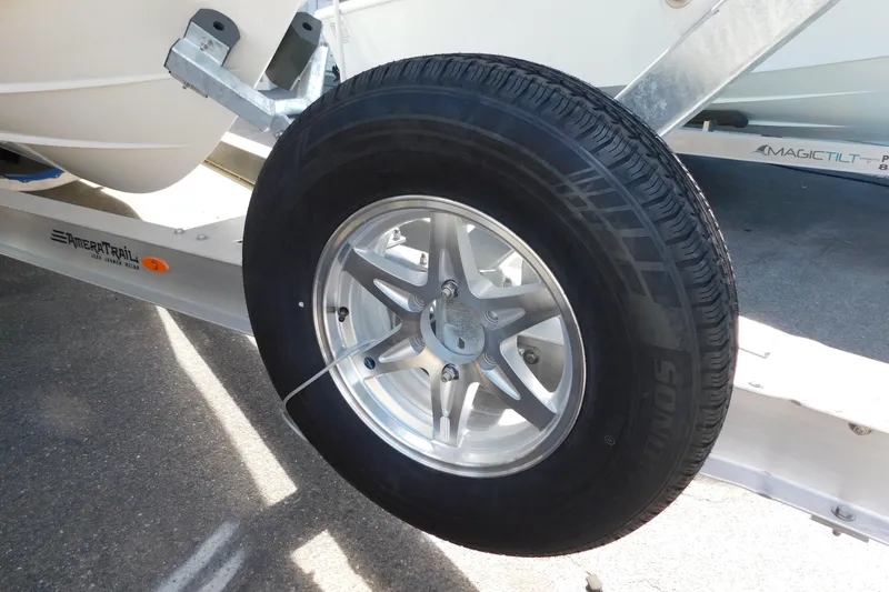 Slide: The Image of Trailer label with specifications and warnings for Cobia 285 Center Console, 2026 model. - 55