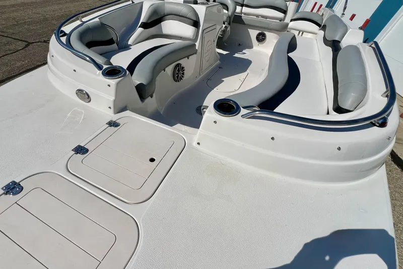 Slide: The Image of 2014 Starcraft 2000 OB Limited boat interior with spacious seating and storage compartments. - 3