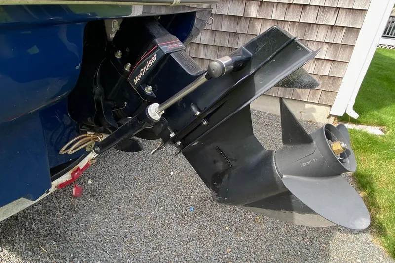 Slide: The Image of 2008 Sea Ray 175 Sport boat with MerCruiser outdrive on gravel surface. - 6