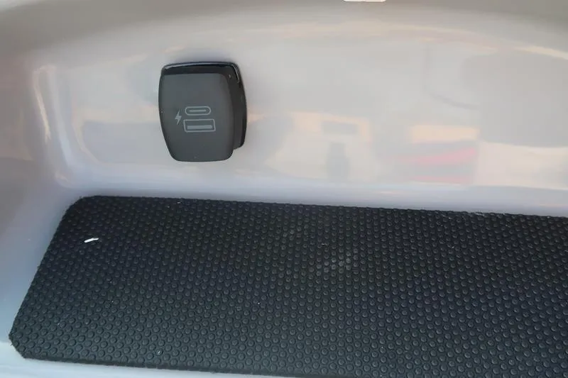 Slide: The Image of 2026 Chaparral 21 SSi boat engine compartment with open hatch. - 13