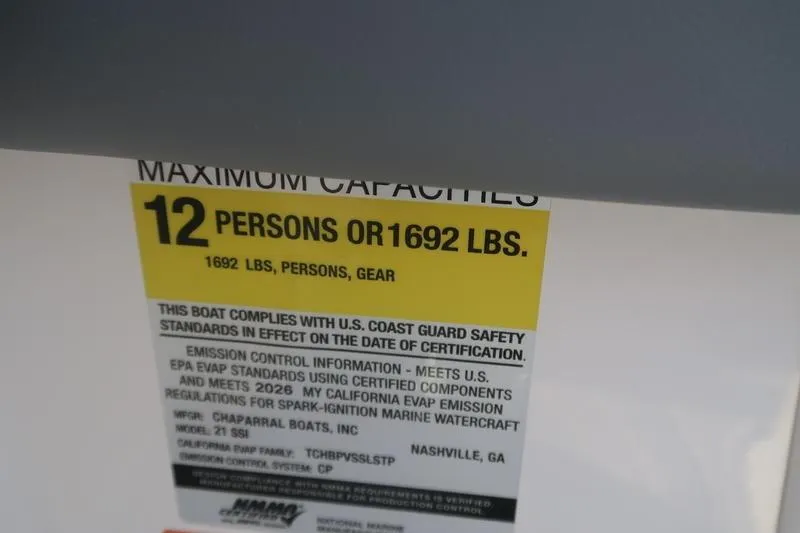 Slide: The Image of Dashboard compartment of 2026 Chaparral 21 SSi boat with sleek design. - 19