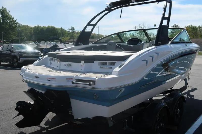 Slide: The Image of 2026 Chaparral 21 SSi boat on trailer at Boat Masters Marine dealership. - 2