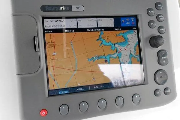 Slide: The Image of Raymarine C80 chartplotter displaying nautical map on a 2006 Hunter 38 sailboat. - 14
