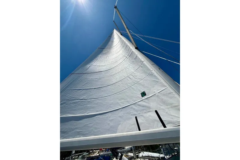 Slide: The Image of 2006 Hunter 38 sailboat deck with rigging and hatches. - 4
