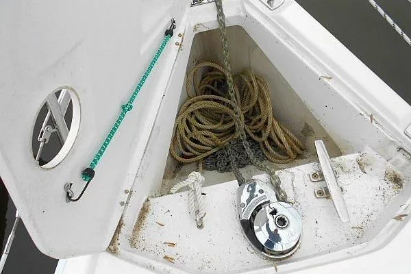 Slide: The Image of Anchor locker of 2006 Hunter 38 sailboat with ropes and winch. - 9
