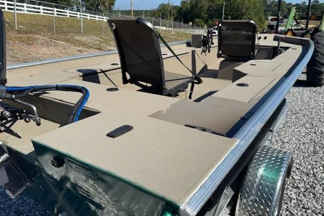 Slide: The Image of 2025 Alweld 1856 PF boat with spacious deck and seating on a trailer. - 7