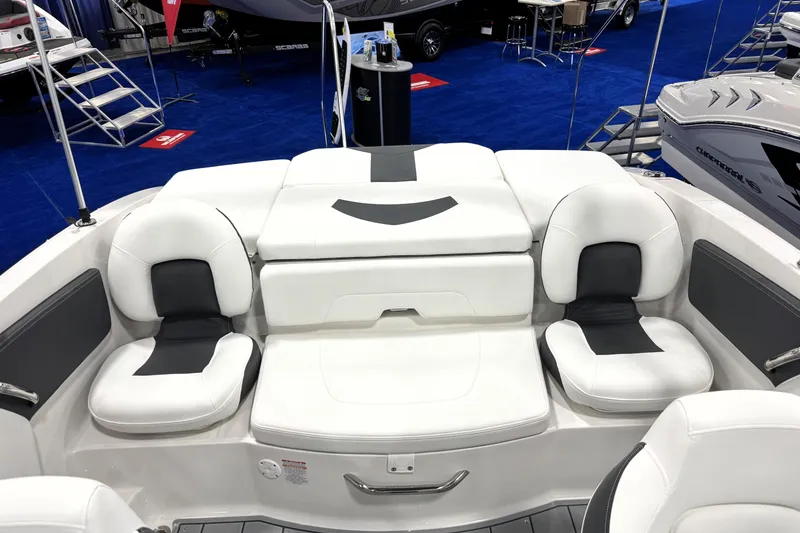 Slide: The Image of 2026 Chaparral 21 SSi Ski & Fish boat interior with white and black seating. - 14