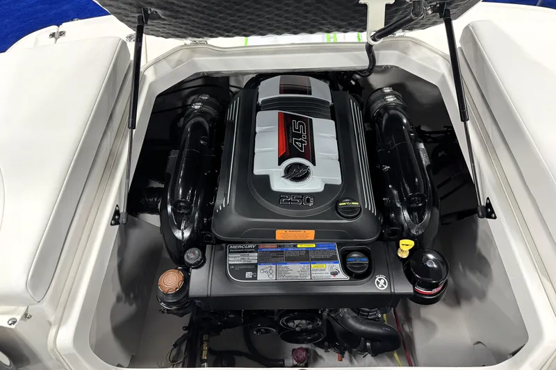 Slide: The Image of Engine compartment of 2026 Chaparral 21 SSi Ski & Fish boat, featuring a Mercury 4.5L engine. - 18