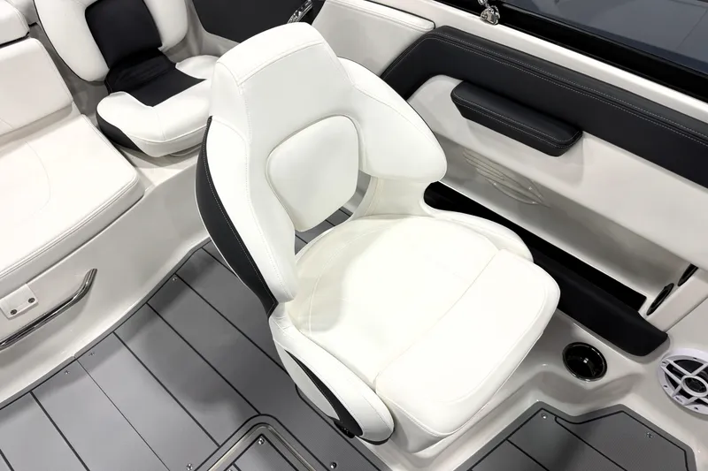 Slide: The Image of 2026 Chaparral 21 SSi Ski & Fish boat interior with white seating and sleek design. - 22