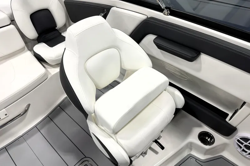Slide: The Image of 2026 Chaparral 21 SSi Ski & Fish boat interior with white seating and modern design. - 23