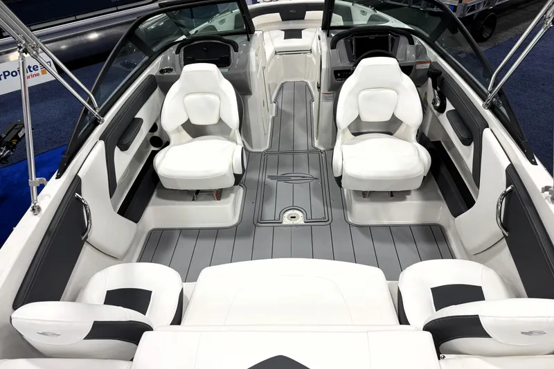 Slide: The Image of 2026 Chaparral 21 SSi Ski & Fish boat interior with white seating and sleek design. - 24