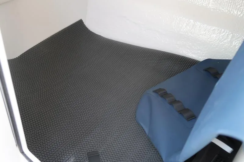 Slide: The Image of 2026 Chaparral 21 SSi boat interior door with latch and hinges. - 25