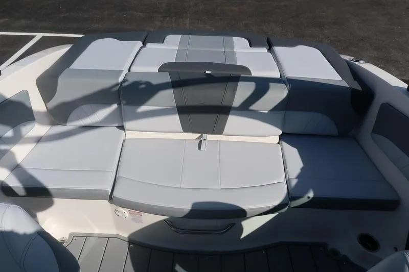 Slide: The Image of 2026 Chaparral 21 SSi boat on trailer, parked outdoors, front view. - 5