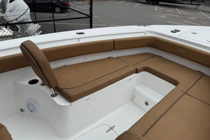 Slide: The Image of 2021 Sea Hunt Gamefish 27 Forward Seating with tan cushions and spacious layout. - 10