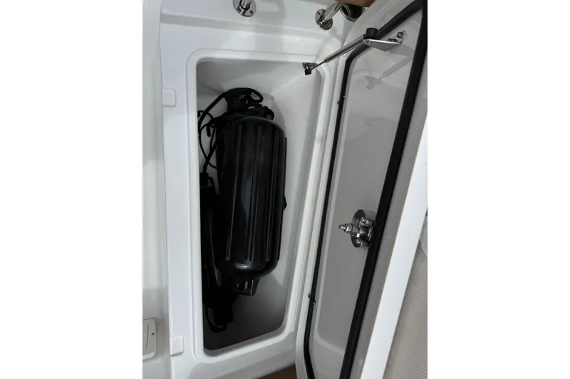 Slide: The Image of Storage compartment in 2021 Sea Hunt Gamefish 27 Forward Seating boat. - 14