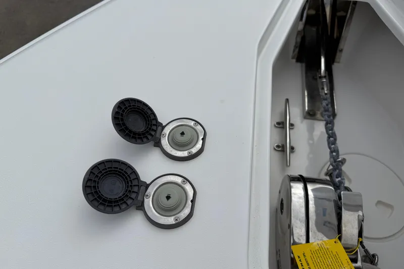 Slide: The Image of 2021 Sea Hunt Gamefish 27 boat deck with open fuel caps and anchor chain. - 16