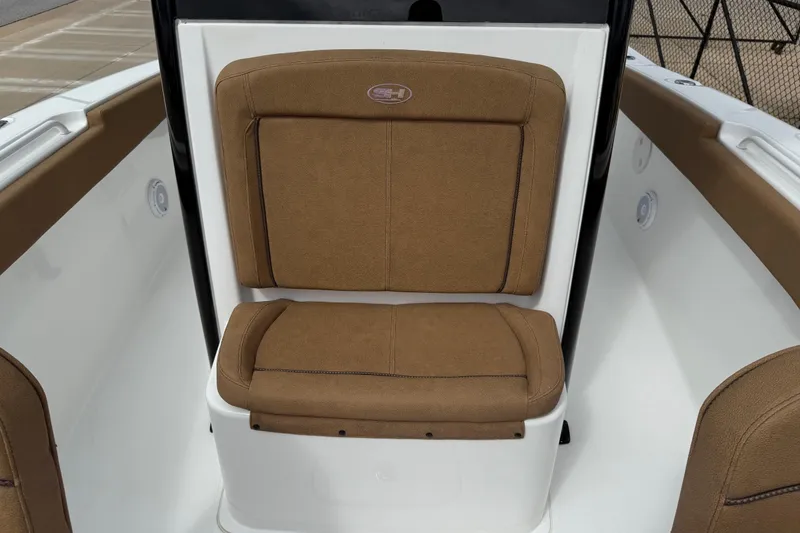 Slide: The Image of 2021 Sea Hunt Gamefish 27 Forward Seating with brown cushioned seat. - 19