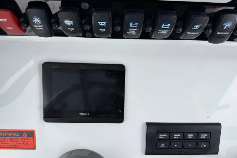 Slide: The Image of Control panel of 2021 Sea Hunt Gamefish 27 with Yamaha display and switches. - 27