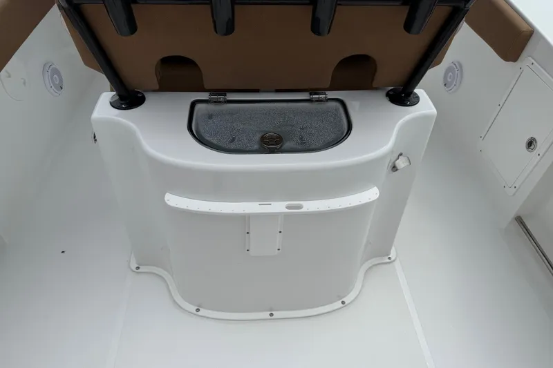 Slide: The Image of 2021 Sea Hunt Gamefish 27 boat interior with forward seating and storage compartment. - 35