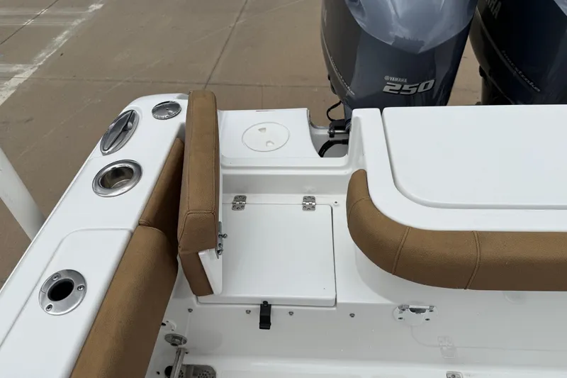 Slide: The Image of 2021 Sea Hunt Gamefish 27 boat interior with seating and Yamaha 250 engines. - 43