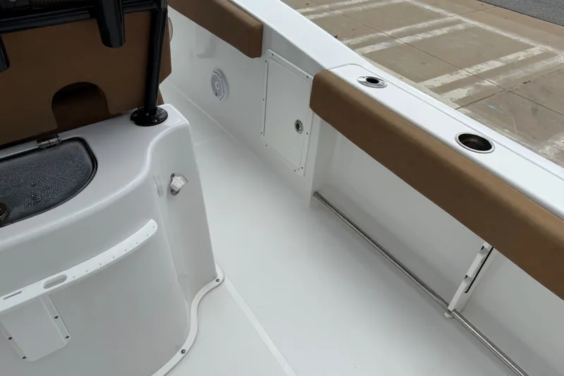 Slide: The Image of 2021 Sea Hunt Gamefish 27 boat interior with forward seating and rod holders. - 47