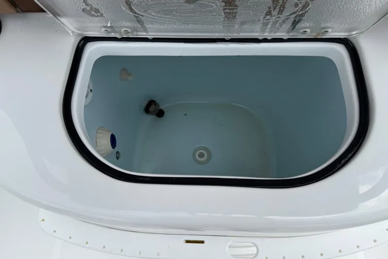 Slide: The Image of Livewell compartment on 2021 Sea Hunt Gamefish 27 Forward Seating boat. - 51