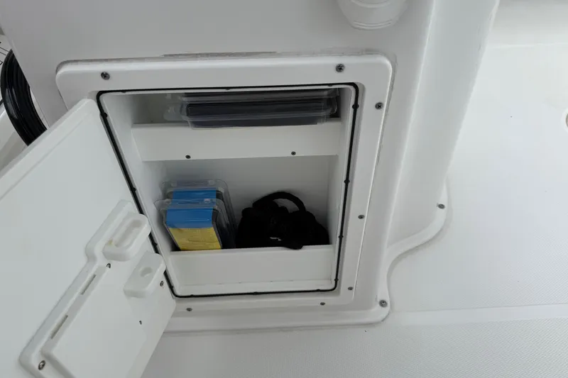 Slide: The Image of Storage compartment on a 2021 Sea Hunt Gamefish 27 Forward Seating boat. - 57