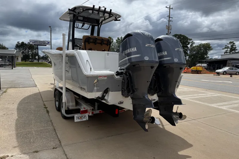 Slide: The Image of 2021 Sea Hunt Gamefish 27 with twin Yamaha 250 engines on trailer. - 6