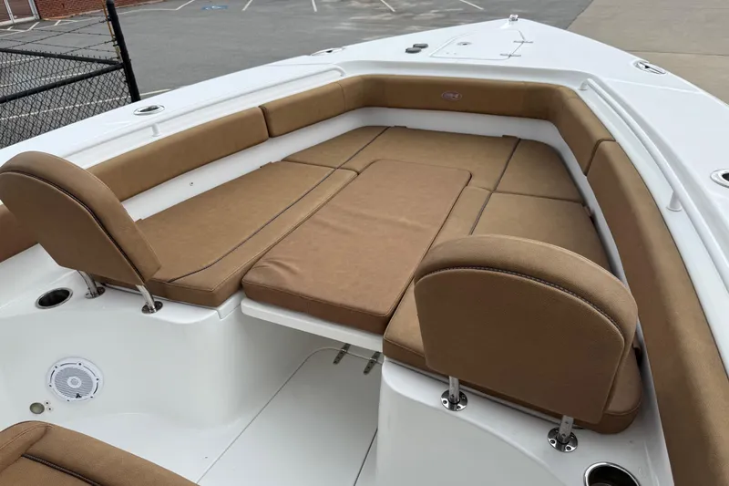 Slide: The Image of 2021 Sea Hunt Gamefish 27 Forward Seating with tan cushions and spacious layout. - 60