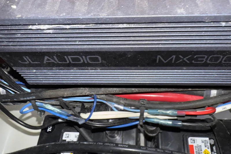 Slide: The Image of JL Audio MX300 amplifier in a 2021 Sea Hunt Gamefish 27 Forward Seating boat. - 70