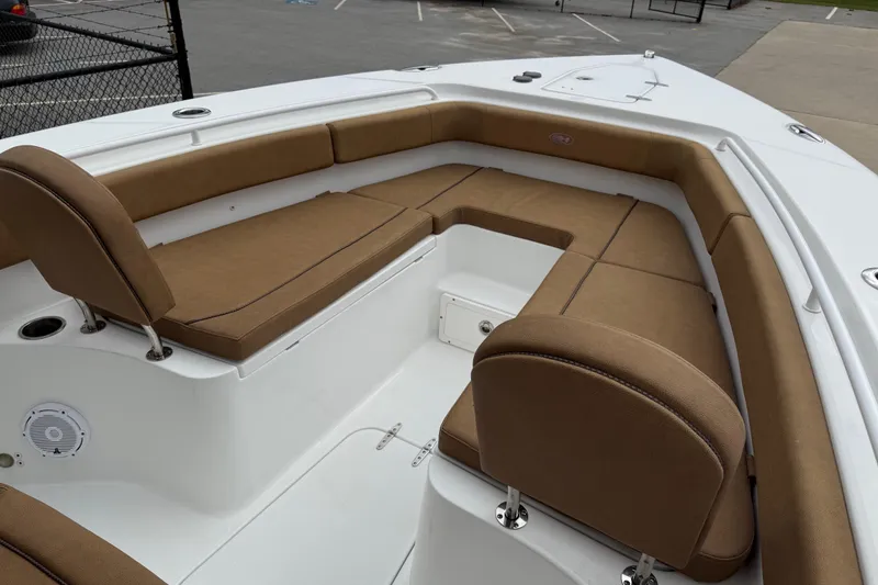 Slide: The Image of 2021 Sea Hunt Gamefish 27 Forward Seating with tan cushions and spacious layout. - 9