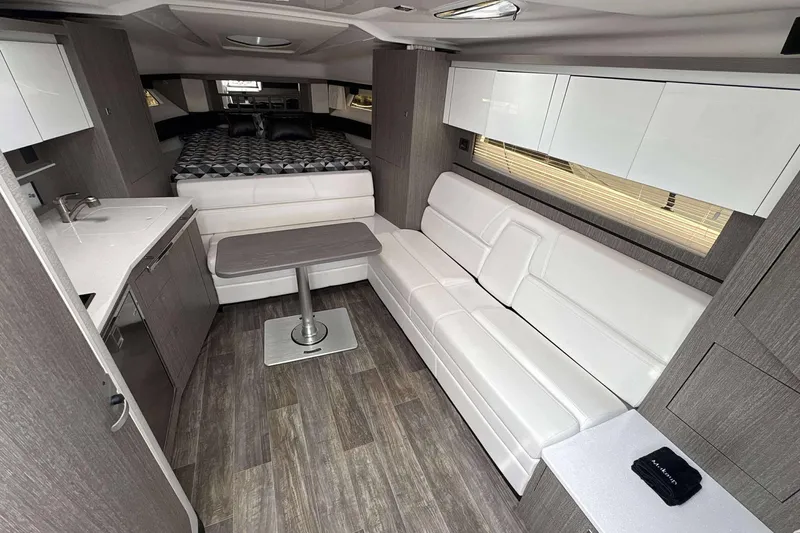 Slide: The Image of Luxurious interior of 2020 Monterey 355 Sport Yacht with modern furnishings and sleek design. - 24