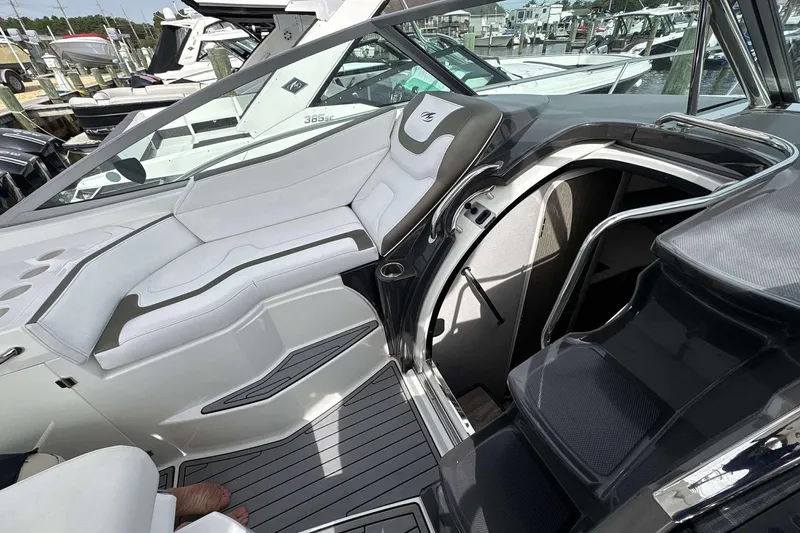Slide: The Image of 2020 Monterey 355 Sport Yacht interior with sleek seating and modern design. - 8