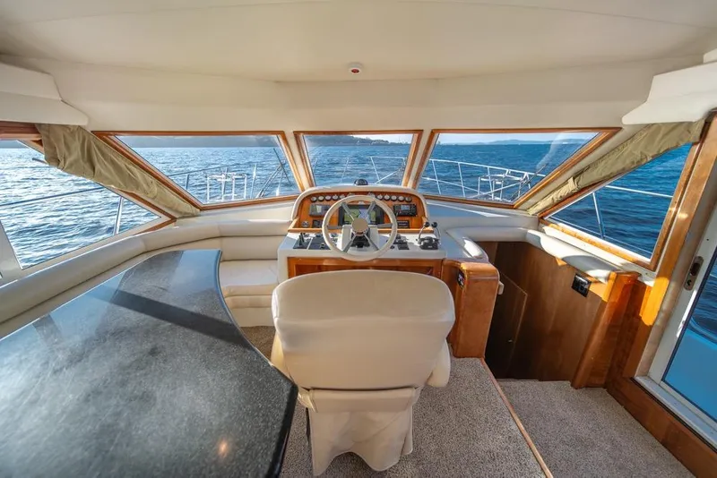 Slide: The Image of Luxurious 2007 Navigator Classic 48 yacht interior with panoramic ocean view. - 14