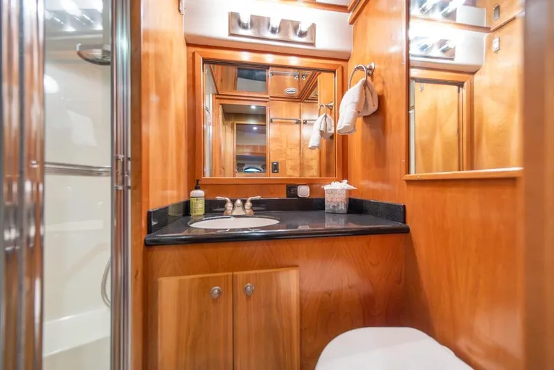 Slide: The Image of Luxurious wooden bathroom interior of 2007 Navigator Classic 48 yacht. - 27