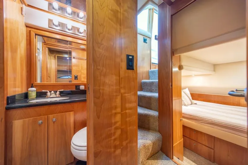 Slide: The Image of Luxurious 2007 Navigator Classic 48 yacht interior with bathroom and cozy bedroom. - 30