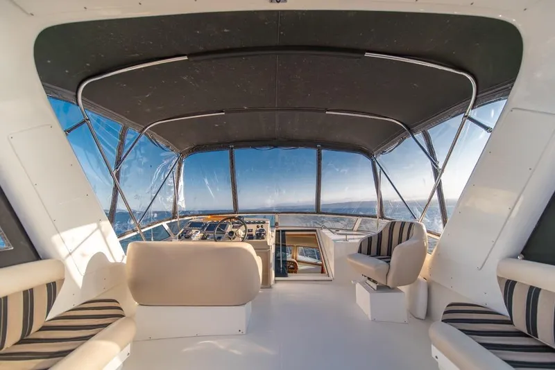 Slide: The Image of Luxurious interior of 2007 Navigator Classic 48 yacht with panoramic ocean views. - 33