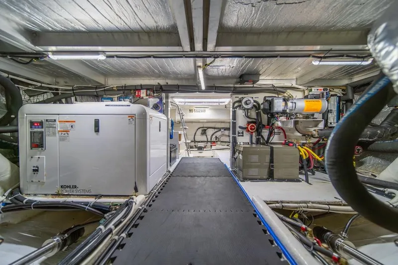 Slide: The Image of Engine room of 2007 Navigator Classic 48 yacht with Kohler power systems. - 45