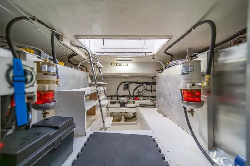 Slide: The Image of Engine room of 2007 Navigator Classic 48 yacht, featuring equipment and wiring. - 46