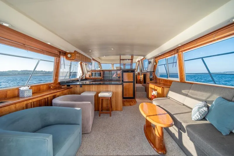 Slide: The Image of Luxurious interior of 2007 Navigator Classic 48 yacht with panoramic ocean views. - 8